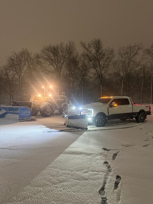 Crews and equipment staged on site as the storm moves in